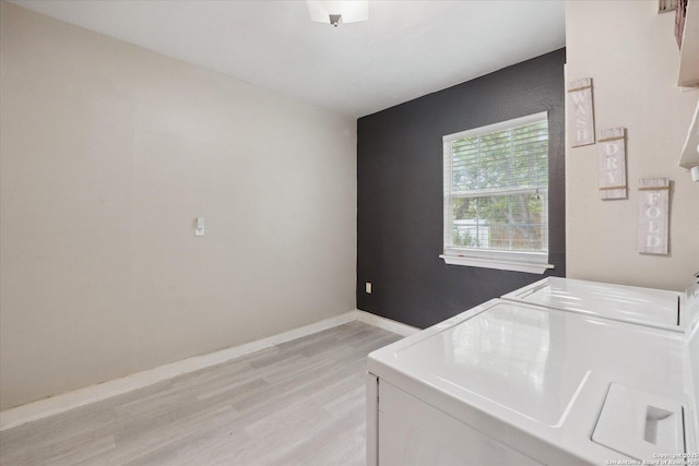 5311 Light House, San Antonio, TX 78242 - laundry area with independent washer and dryer and light wood-style flooring