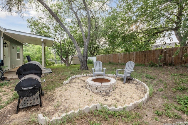5311 Light House, San Antonio, TX 78242 - fenced backyard with an outdoor fire pit
