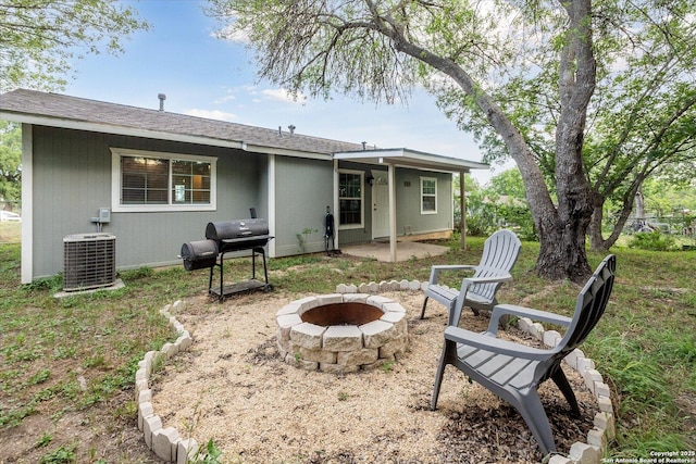 5311 Light House, San Antonio, TX 78242 - back of house with a fire pit, a patio, and roof with shingles