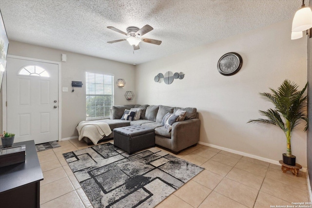 5311 Light House, San Antonio, TX 78242 - living area featuring light tile patterned floors, ceiling fan, and a textured ceiling