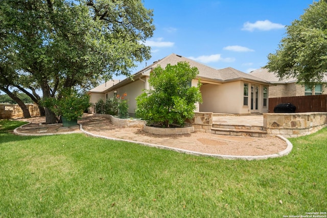 101 Boulder Crk, Boerne, TX 78006 - rear view of house featuring stucco siding and a patio area
