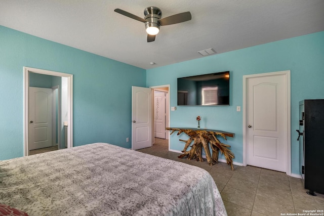 168 Landmark Park, Cibolo, TX 78108 - bedroom featuring tile patterned floors and a ceiling fan