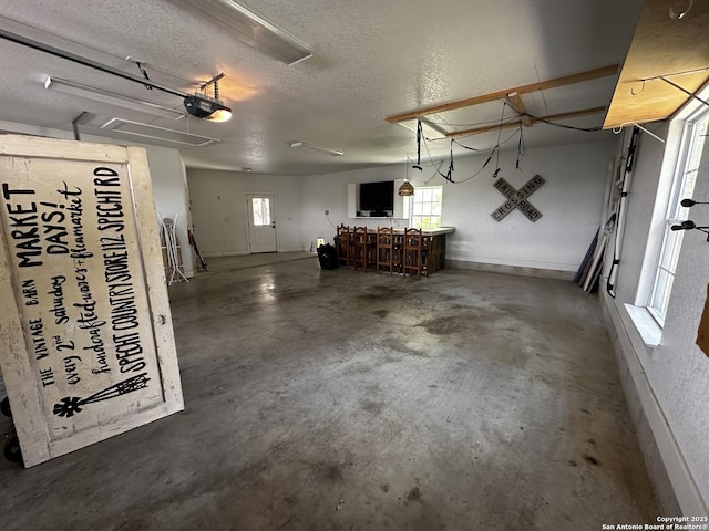2521 Bay Hl, Bulverde, TX 78163 - garage featuring a garage door opener