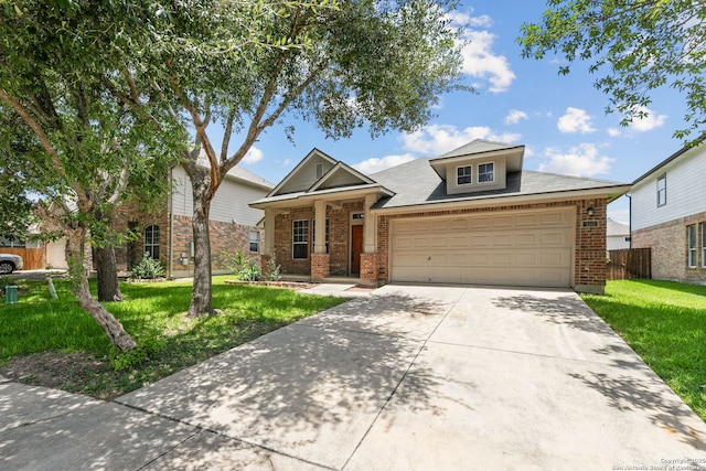 153 Bison Ln, Cibolo, TX 78108 - view of front of house featuring brick siding, concrete driveway, and an attached garage