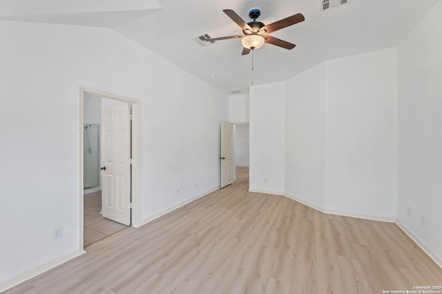153 Bison Ln, Cibolo, TX 78108 - spare room featuring a ceiling fan, wood finished floors, and lofted ceiling