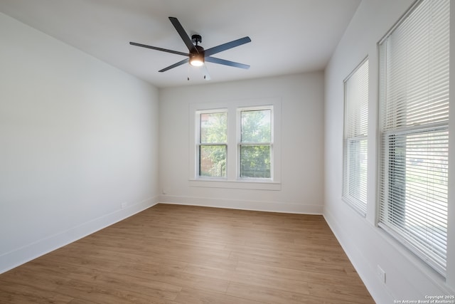 1002 Aganier, San Antonio, TX 78212 - unfurnished room featuring light wood-type flooring and ceiling fan