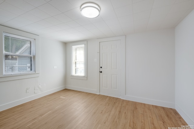 1002 Aganier, San Antonio, TX 78212 - foyer entrance featuring light wood-type flooring and baseboards