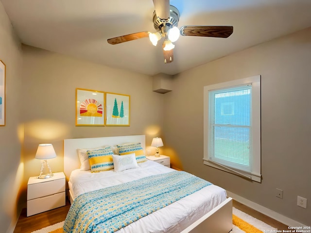 443 Seele, New Braunfels, TX 78130 - bedroom featuring a ceiling fan and wood finished floors