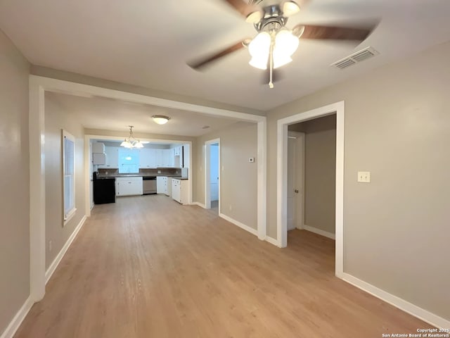 443 Seele, New Braunfels, TX 78130 - unfurnished living room with light wood-type flooring and a ceiling fan