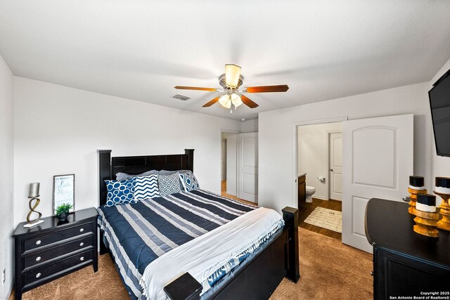 3827 Southton Vw, San Antonio, TX 78222 - carpeted bedroom featuring ensuite bath and a ceiling fan