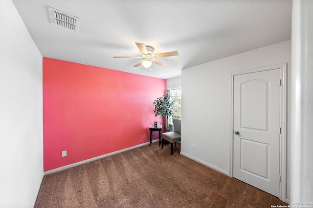 3827 Southton Vw, San Antonio, TX 78222 - living area with carpet flooring and a ceiling fan