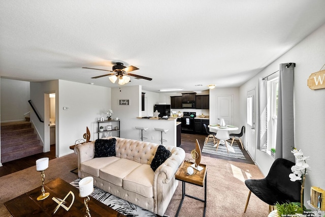3827 Southton Vw, San Antonio, TX 78222 - living area with stairway and a ceiling fan