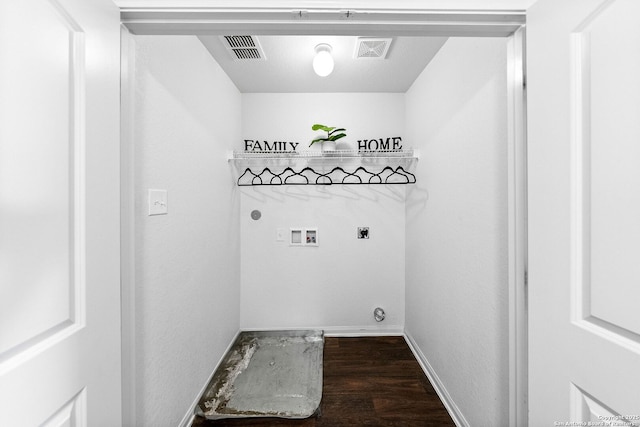 3827 Southton Vw, San Antonio, TX 78222 - laundry room featuring electric dryer hookup, washer hookup, and dark wood-type flooring