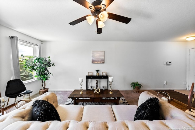 3827 Southton Vw, San Antonio, TX 78222 - living room featuring ceiling fan and carpet