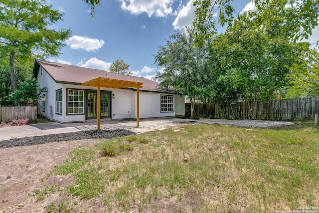 3311 Coral Grove, San Antonio, TX 78247 - back of house featuring a pergola, a fenced backyard, and a patio area