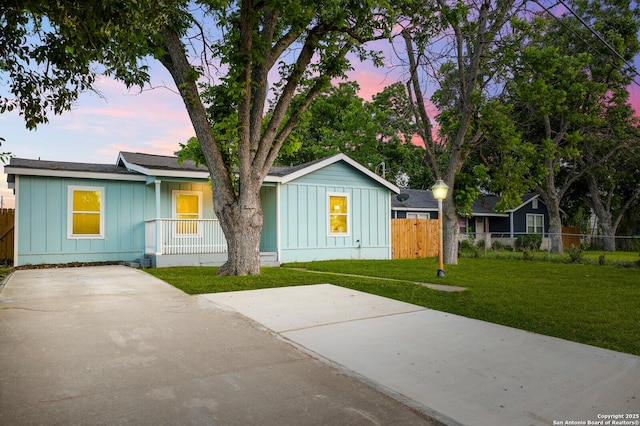 559 W Nacogdoches St, New Braunfels, TX 78130 - single story home with board and batten siding and a porch