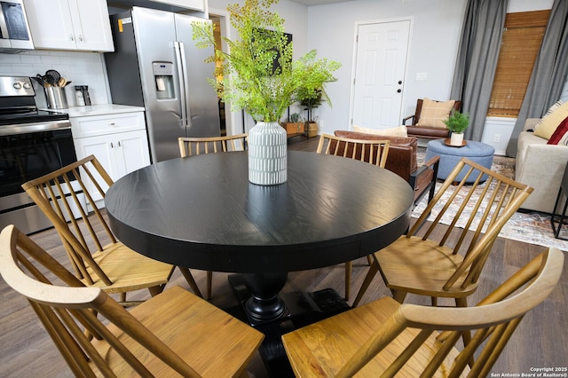 559 W Nacogdoches St, New Braunfels, TX 78130 - dining area with wood finished floors