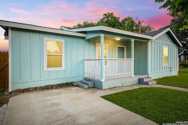 559 W Nacogdoches St, New Braunfels, TX 78130 - view of front of house featuring covered porch and board and batten siding