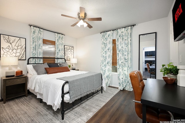 559 W Nacogdoches St, New Braunfels, TX 78130 - bedroom featuring wood finished floors and a ceiling fan