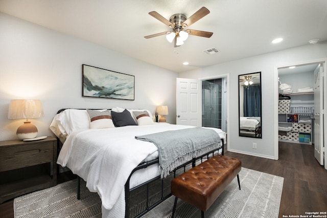 559 W Nacogdoches St, New Braunfels, TX 78130 - bedroom featuring a spacious closet, dark wood-style flooring, a closet, recessed lighting, and ceiling fan