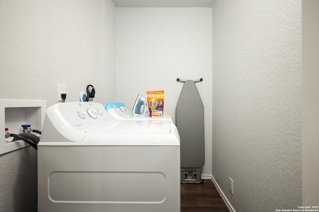 559 W Nacogdoches St, New Braunfels, TX 78130 - washroom with a textured wall, washer and dryer, and wood finished floors