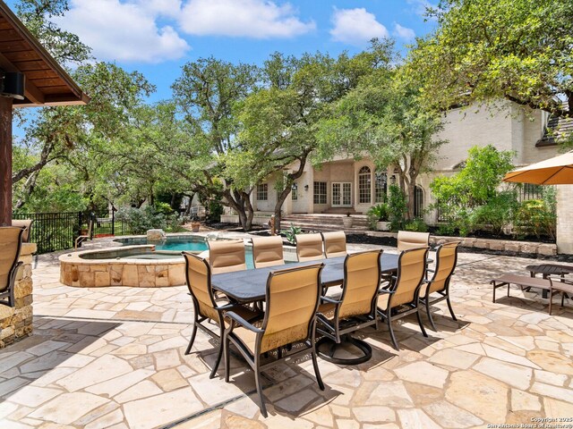 6 De Zavala, Shavano Park, TX 78231 - view of patio / terrace with outdoor dining area and a pool with connected hot tub