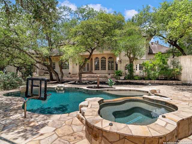 6 De Zavala, Shavano Park, TX 78231 - swimming pool featuring an in-ground hot tub and a patio