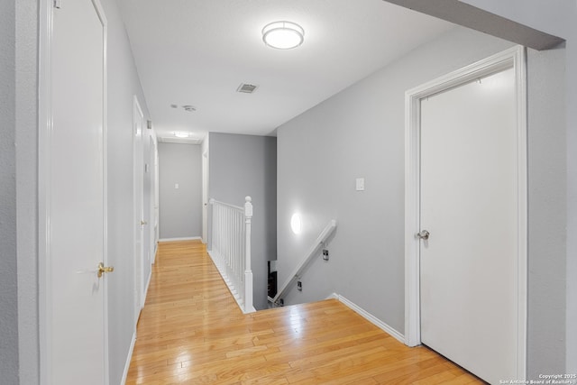 1654 Rob Roy, San Antonio, TX 78251 - corridor featuring an upstairs landing and light wood-style flooring