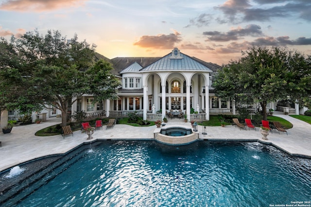2 Admirals Way, San Antonio, TX 78257 - back of house with a patio and a pool with connected hot tub