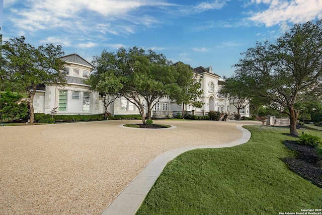 2 Admirals Way, San Antonio, TX 78257 - surrounding community with a yard and curved driveway