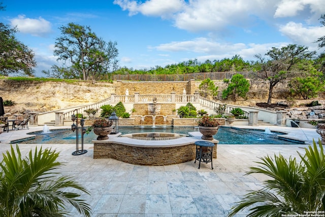 2 Admirals Way, San Antonio, TX 78257 - outdoor pool featuring an in-ground hot tub and a patio area