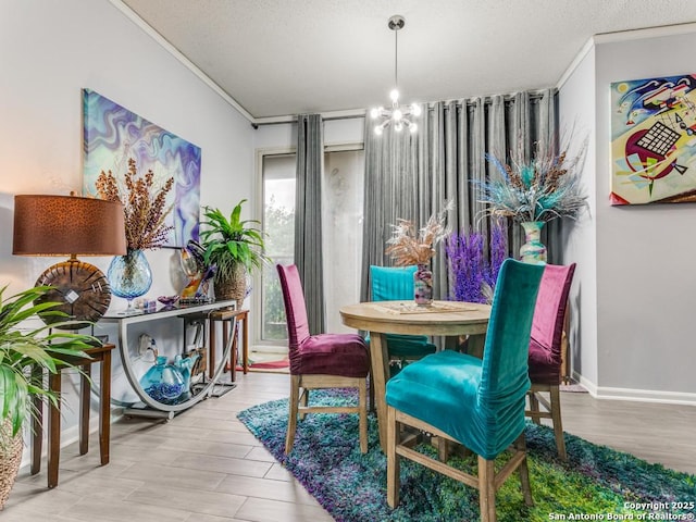 1 Towers Park Unit 211, San Antonio, TX 78209 - dining area with a chandelier, wood finished floors, crown molding, and a textured ceiling
