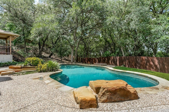 3501 Big Horn, Schertz, TX 78154 - view of swimming pool featuring a fenced backyard and stairs