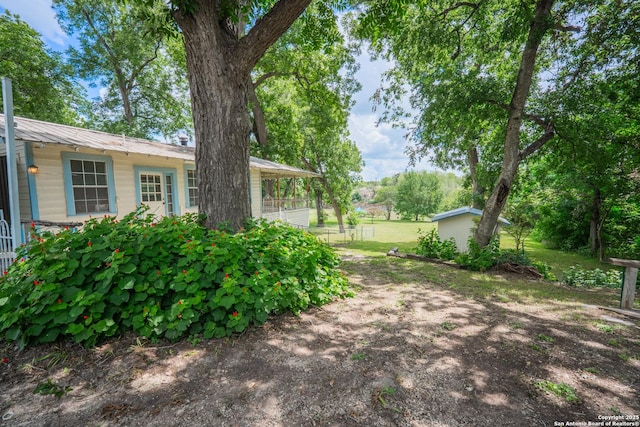 9071 Fm 725, Mcqueeney, TX 78123 - view of yard featuring a storage shed