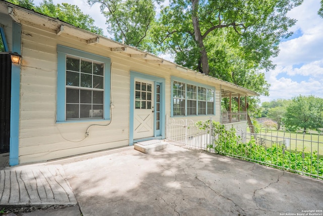 9071 Fm 725, Mcqueeney, TX 78123 - doorway to property featuring a patio area