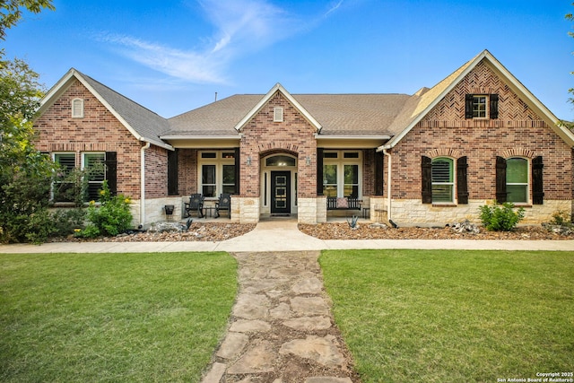 1162 Thunder Cloud, Spring Branch, TX 78070 - view of front of house featuring a shingled roof, brick siding, and a front yard