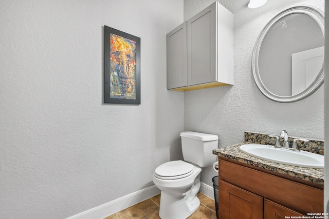 1162 Thunder Cloud, Spring Branch, TX 78070 - bathroom with vanity, a textured wall, and tile patterned flooring