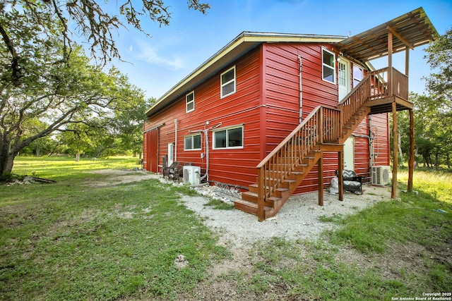 1162 Thunder Cloud, Spring Branch, TX 78070 - view of property exterior with stairs, a lawn, and a deck