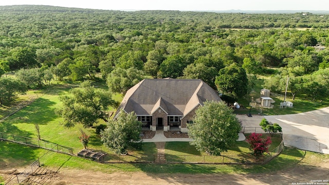 1162 Thunder Cloud, Spring Branch, TX 78070 - aerial view of property and surrounding area featuring a heavily wooded area