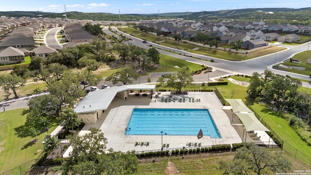 6041 Vestige Bnd, Bulverde, TX 78163 - aerial view of residential area with a pool area