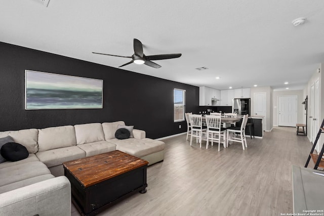6041 Vestige Bnd, Bulverde, TX 78163 - living area with ceiling fan, light wood-style flooring, and recessed lighting