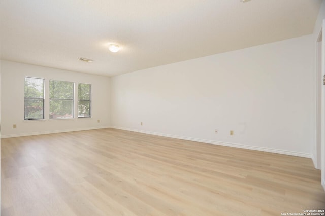 5510 Camry Spgs, San Antonio, TX 78251 - empty room with light wood-style flooring and baseboards