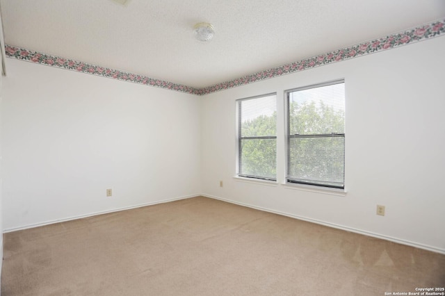 5510 Camry Spgs, San Antonio, TX 78251 - carpeted empty room featuring baseboards