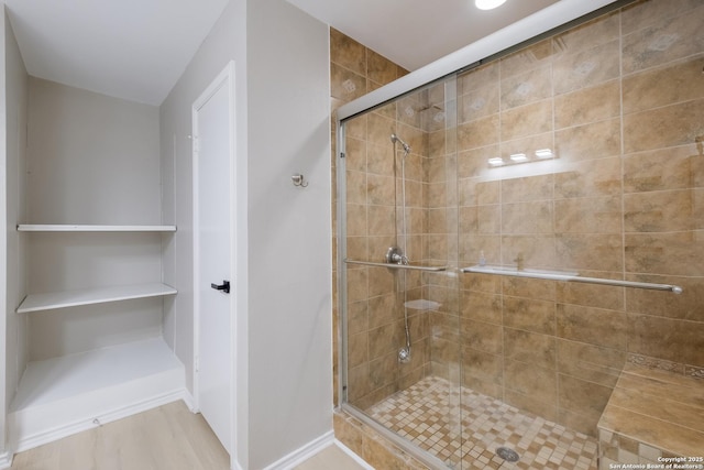 16738 Stoney Glade, San Antonio, TX 78247 - bathroom featuring a stall shower and baseboards