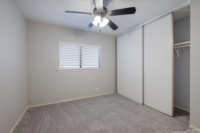 16738 Stoney Glade, San Antonio, TX 78247 - unfurnished bedroom with carpet, a textured ceiling, a closet, and a ceiling fan