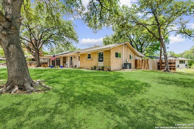 3035 Sir Phillip, San Antonio, TX 78209 - rear view of house with brick siding