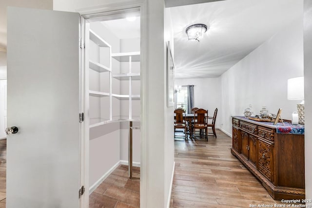 3035 Sir Phillip, San Antonio, TX 78209 - hallway featuring light wood-type flooring and baseboards