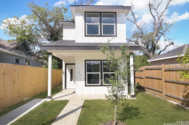 165 N San Felipe, San Antonio, TX 78237 - view of front of home with board and batten siding