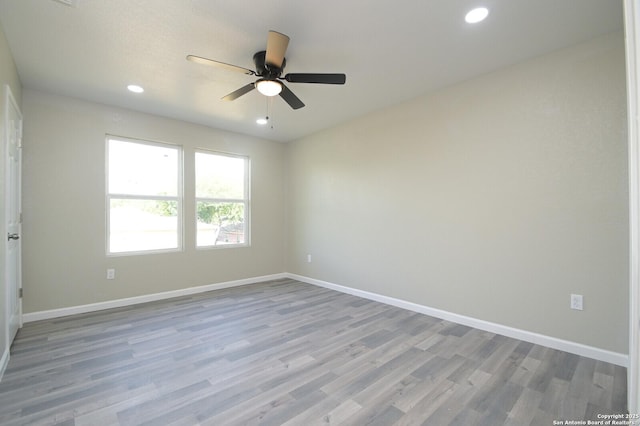 165 N San Felipe, San Antonio, TX 78237 - empty room featuring a ceiling fan, recessed lighting, and wood finished floors