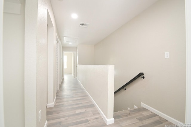 165 N San Felipe, San Antonio, TX 78237 - corridor with an upstairs landing, light wood-style floors, attic access, and recessed lighting